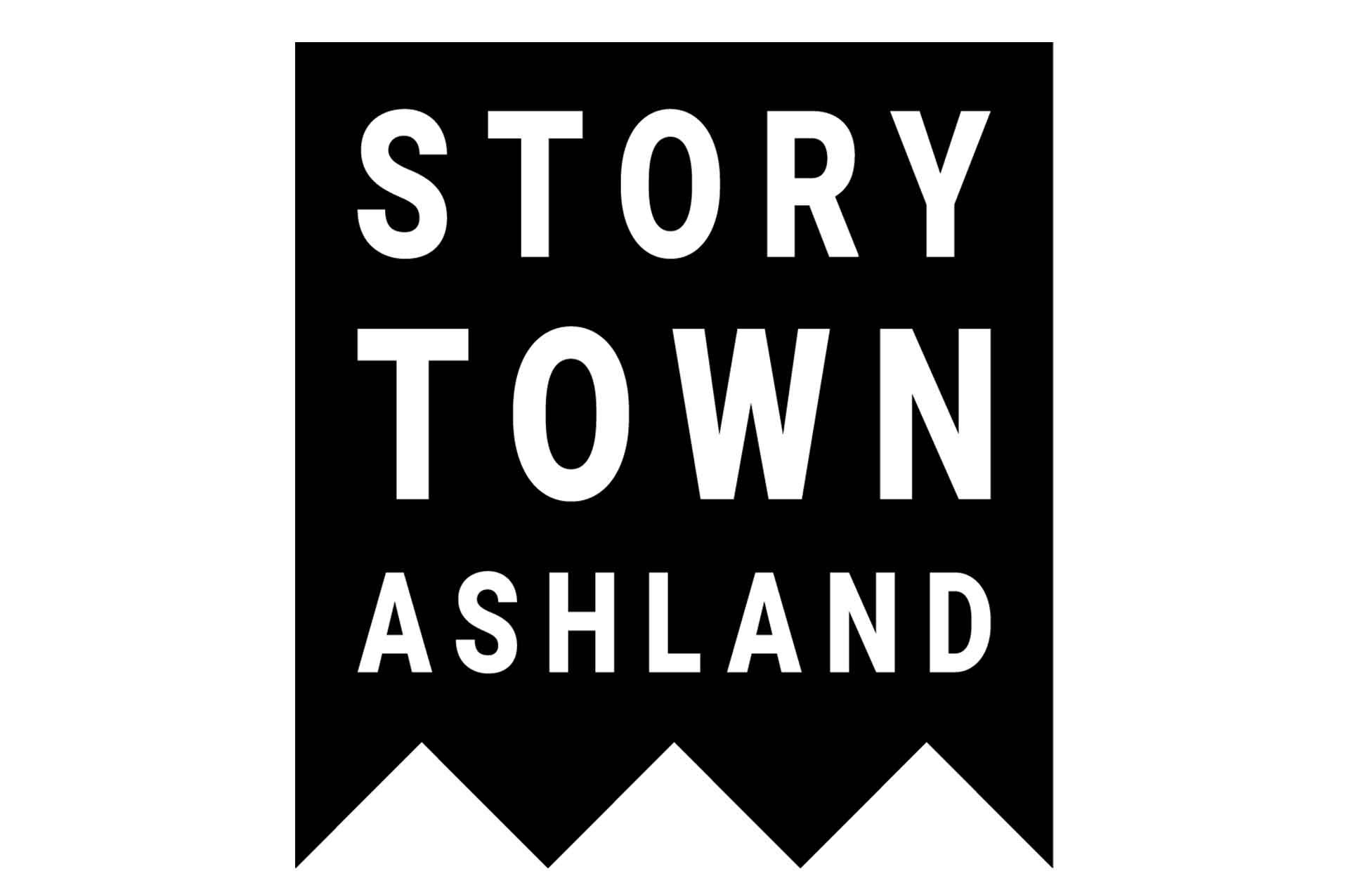 A black Story Town logo on a white background.