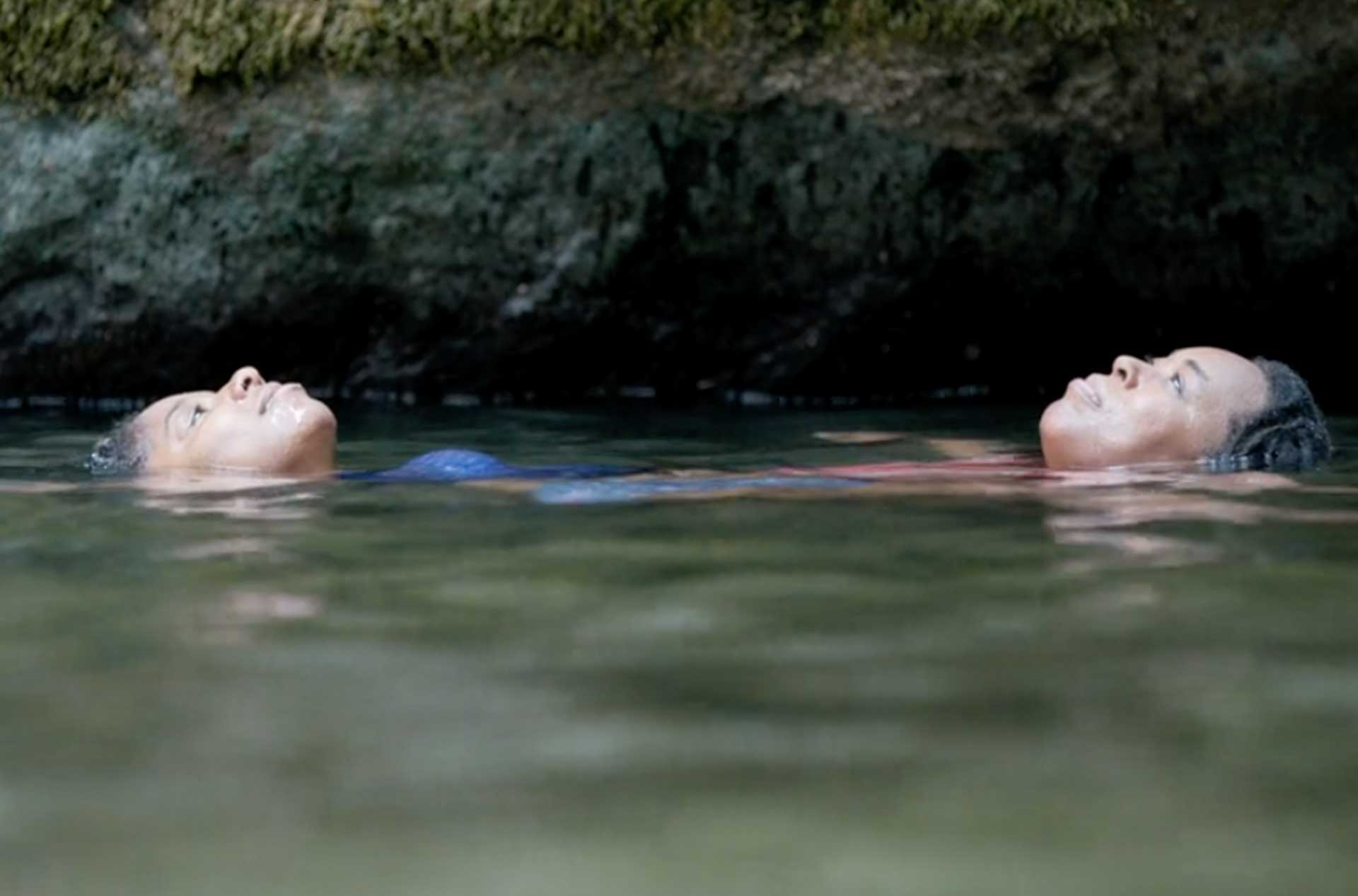 "She" and "Her" floating in the water