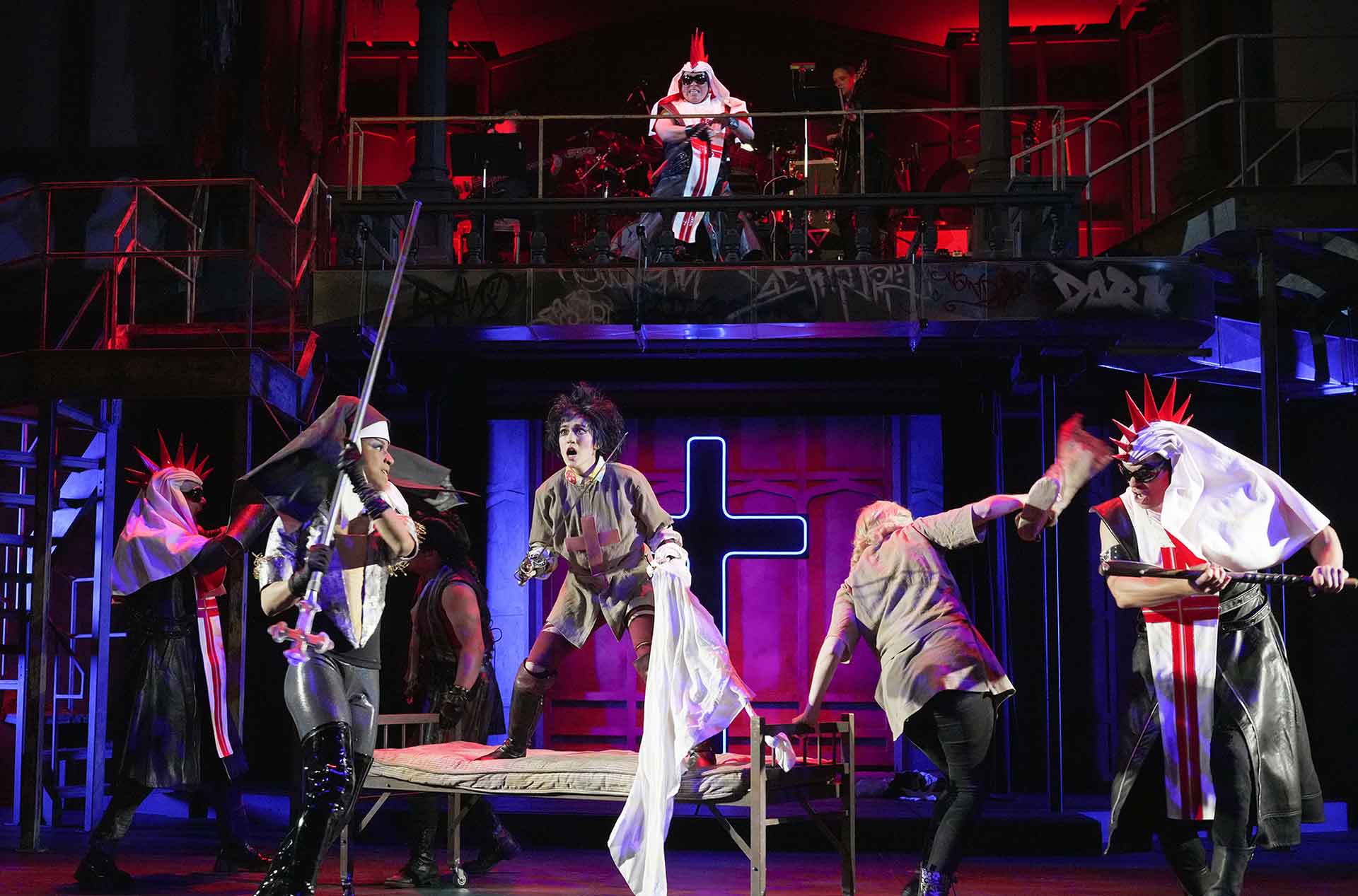 Wide-angle view of several people fighting.