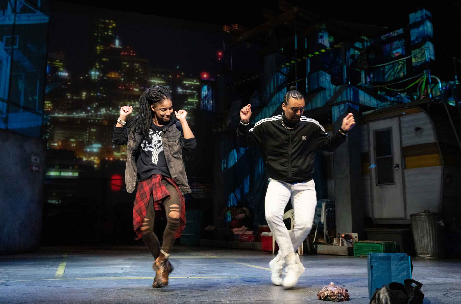 Two people dancing next to each other