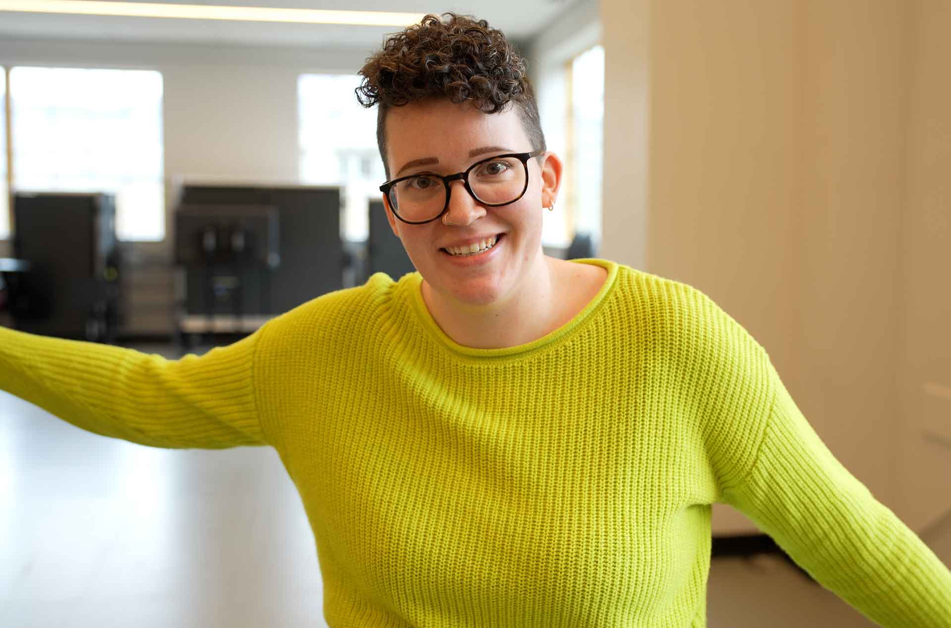 A person facing the camera smiling.