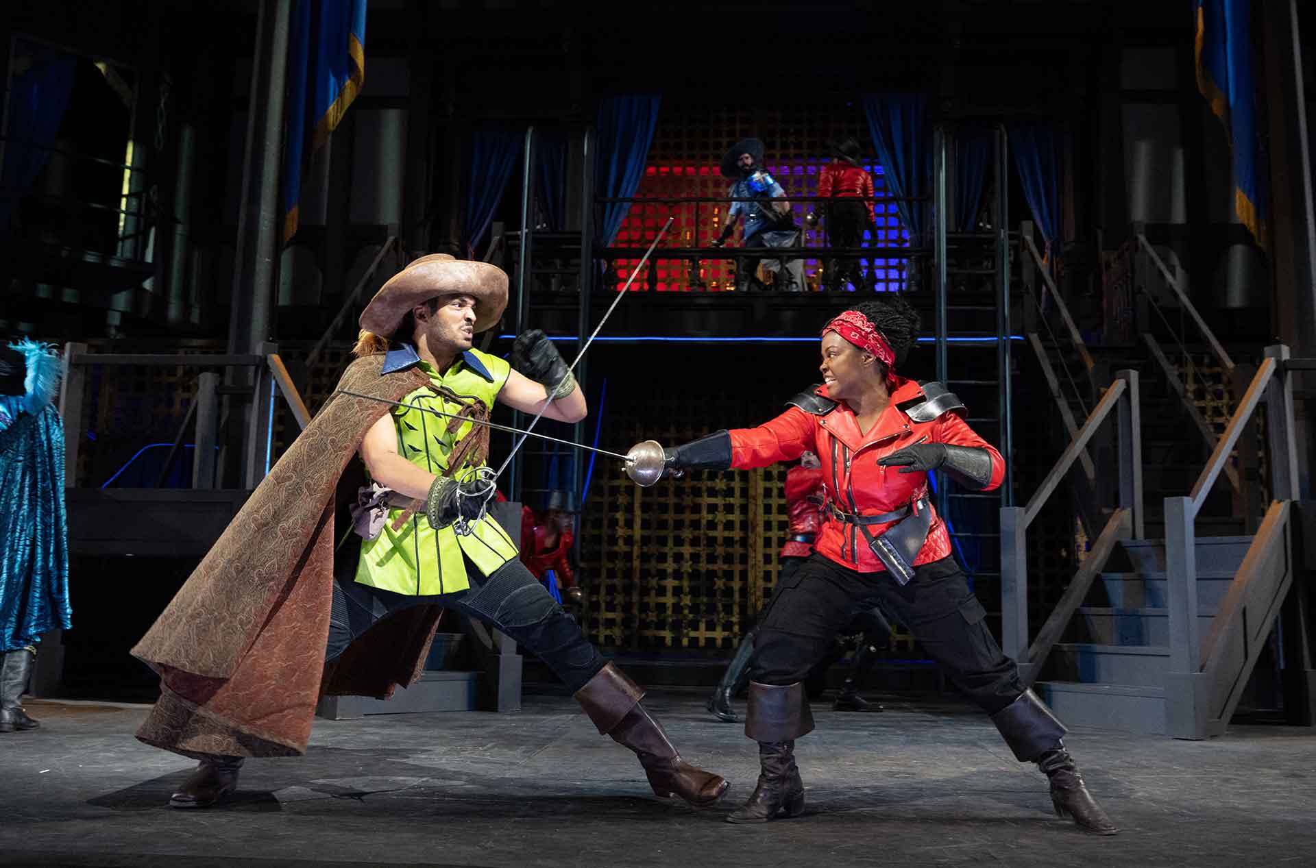 People sword fighting.