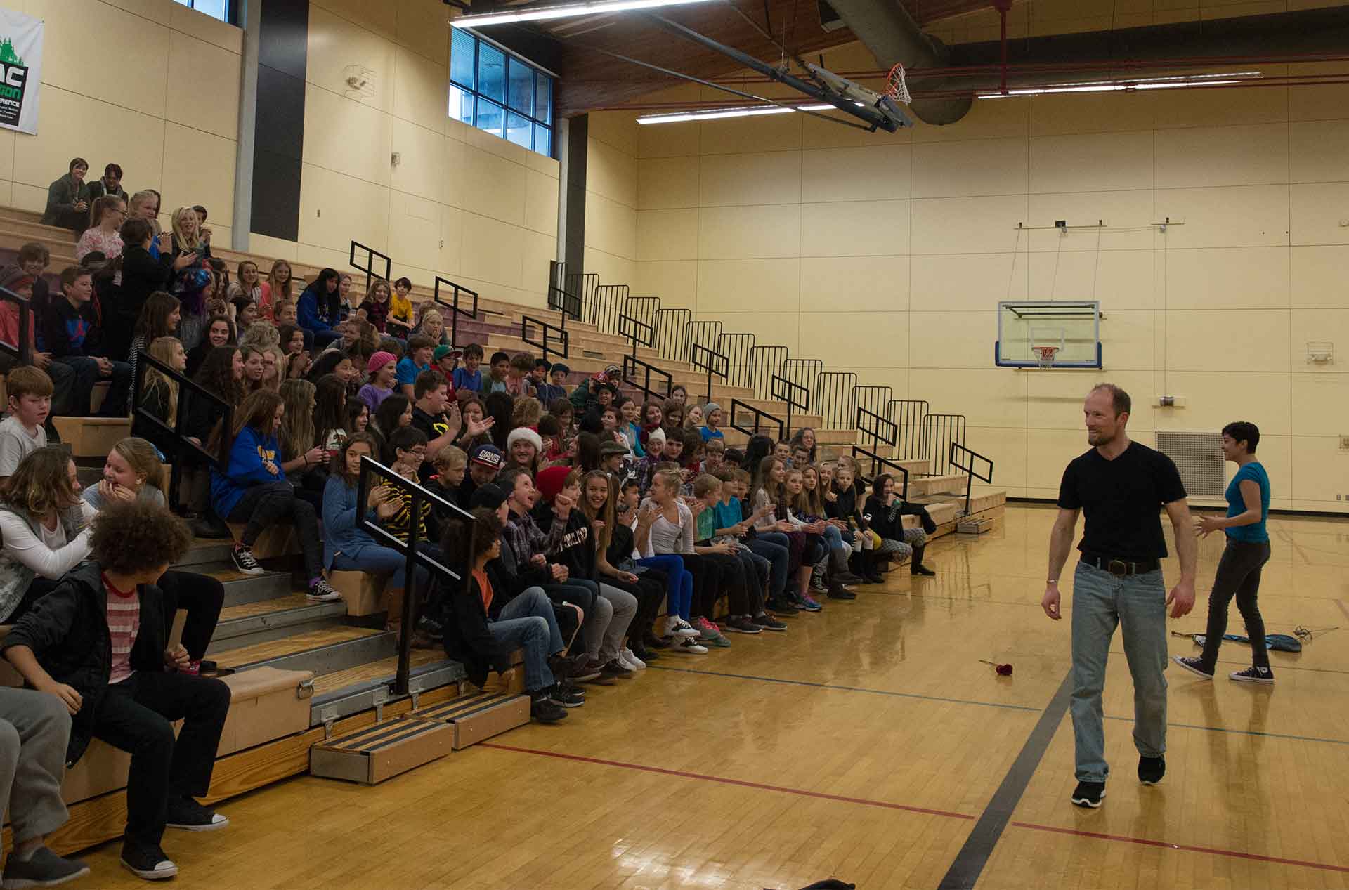 Two people presenting to an auditorium.
