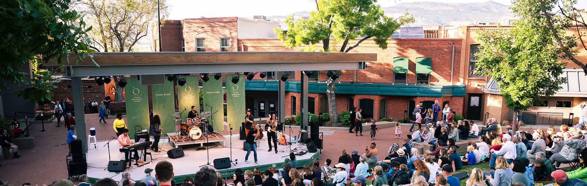 A band on an outdoor stage.