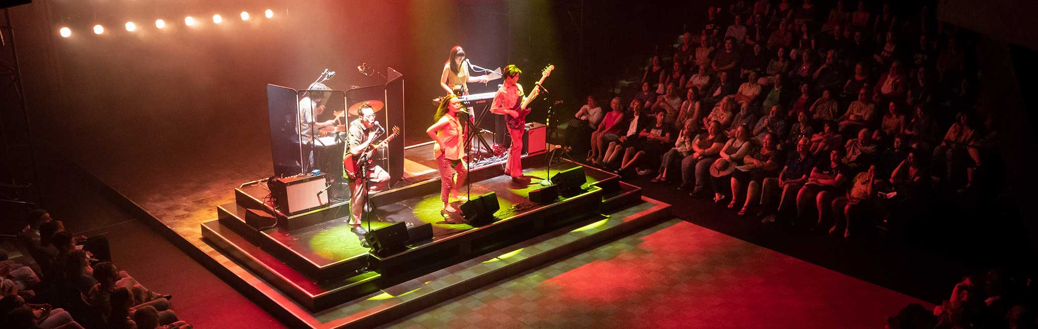 Cambodian Rock Band - Cyclos performing on stage.