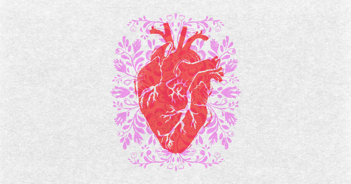 Anatomical heart surrounded by decorative floral shapes in pink and red.